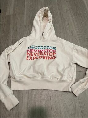 The North Face Women's White Hoodie with Pink Accent